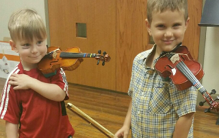 Boys with violins